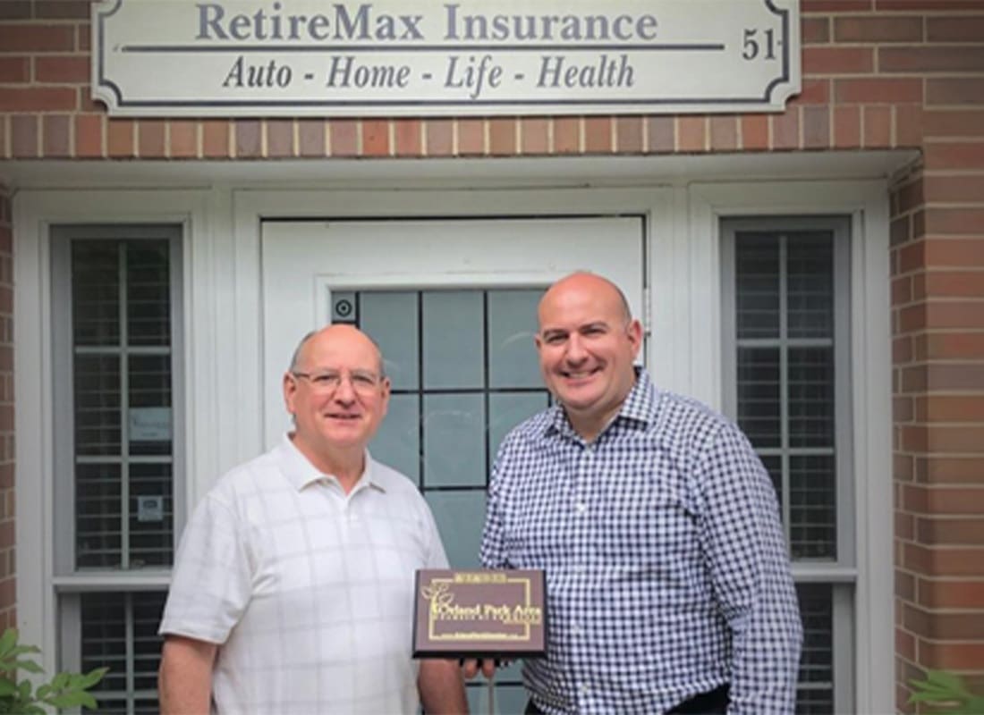 About Our Agency - Joe and His Dad Posing In Front of the RetireMax Insurance Office